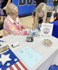 Bell County Clerk Debbie Gambrel was recently at Bell County High School to answer student questions and help them get registered to vote. She is pictured helping student Halle Jones get registered.