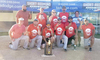 The team sponsored by Ronnie Graves Logging from Washburn, Tenn., poses with their trophy after winning the co-ed softball tournament held in Middlesboro for Suicide Awareness and Prevention in remembrance of Candace Lynn England.